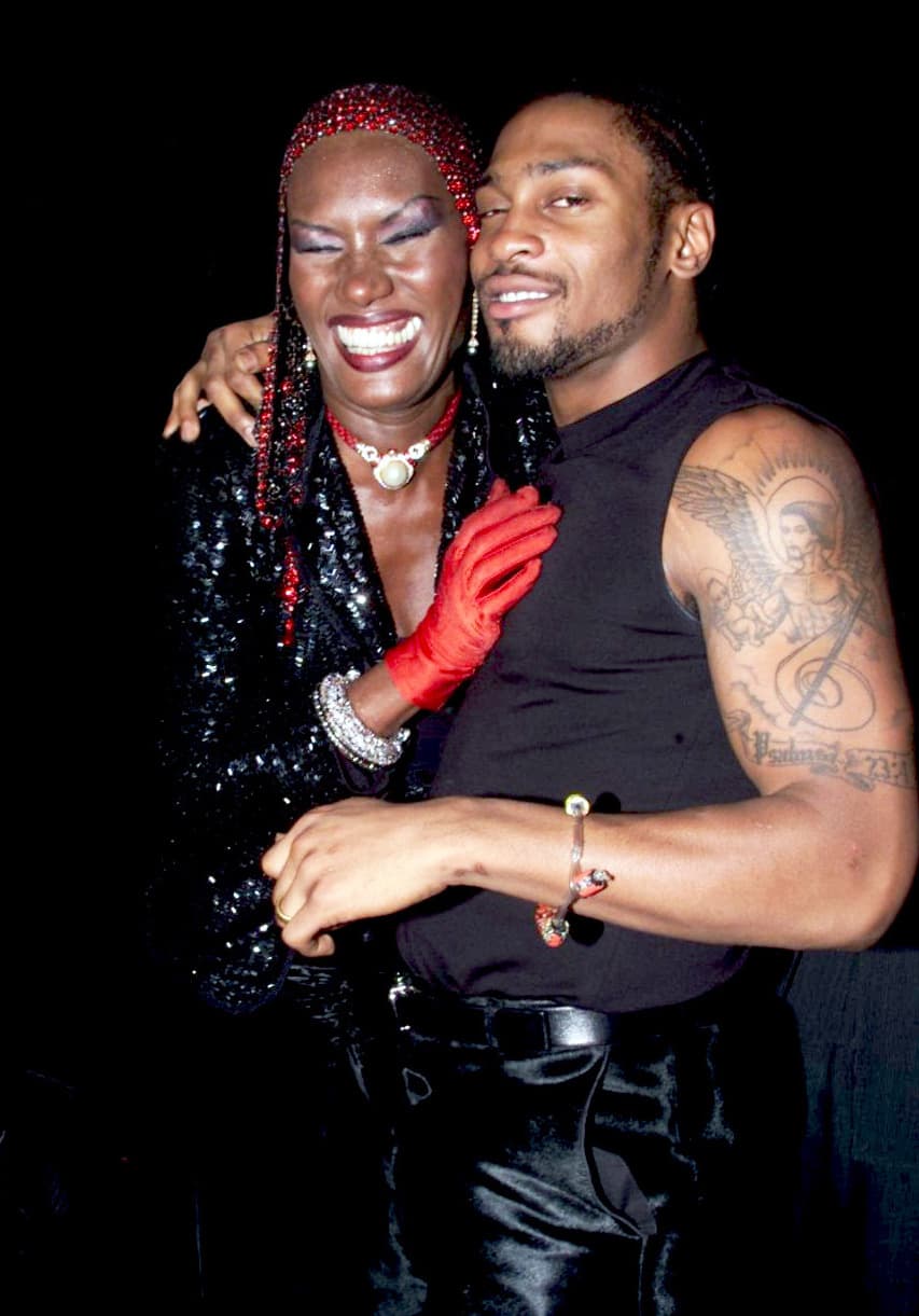 Grace Jones and D'Angelo at Giorgio Armani exhibition opening reception, The Guggenheim Museum, New York, January 17, 2001. Photo by K Mazur.