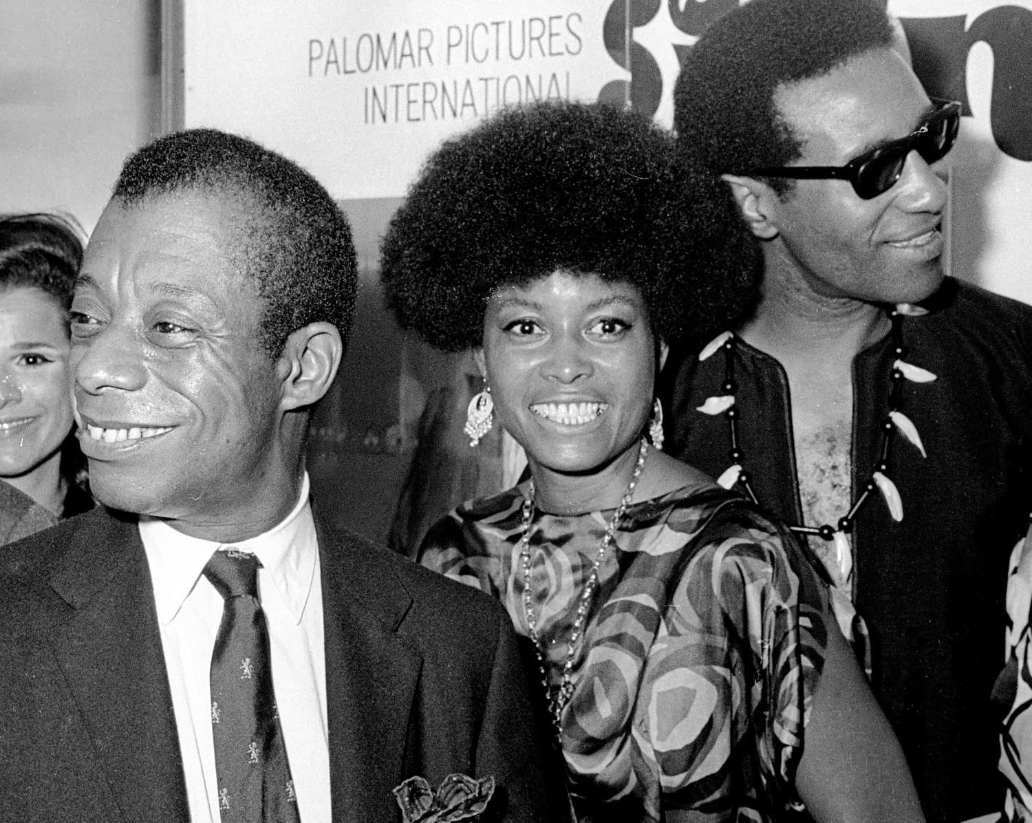 James Baldwin, Abbey Lincoln, and Max Roach attend the premiere of 'For Love of Ivy' at Loew's Tower East Theater, New York, July 16, 1968. Photo by Ron Galella. Ron Galella Collection via Getty Images